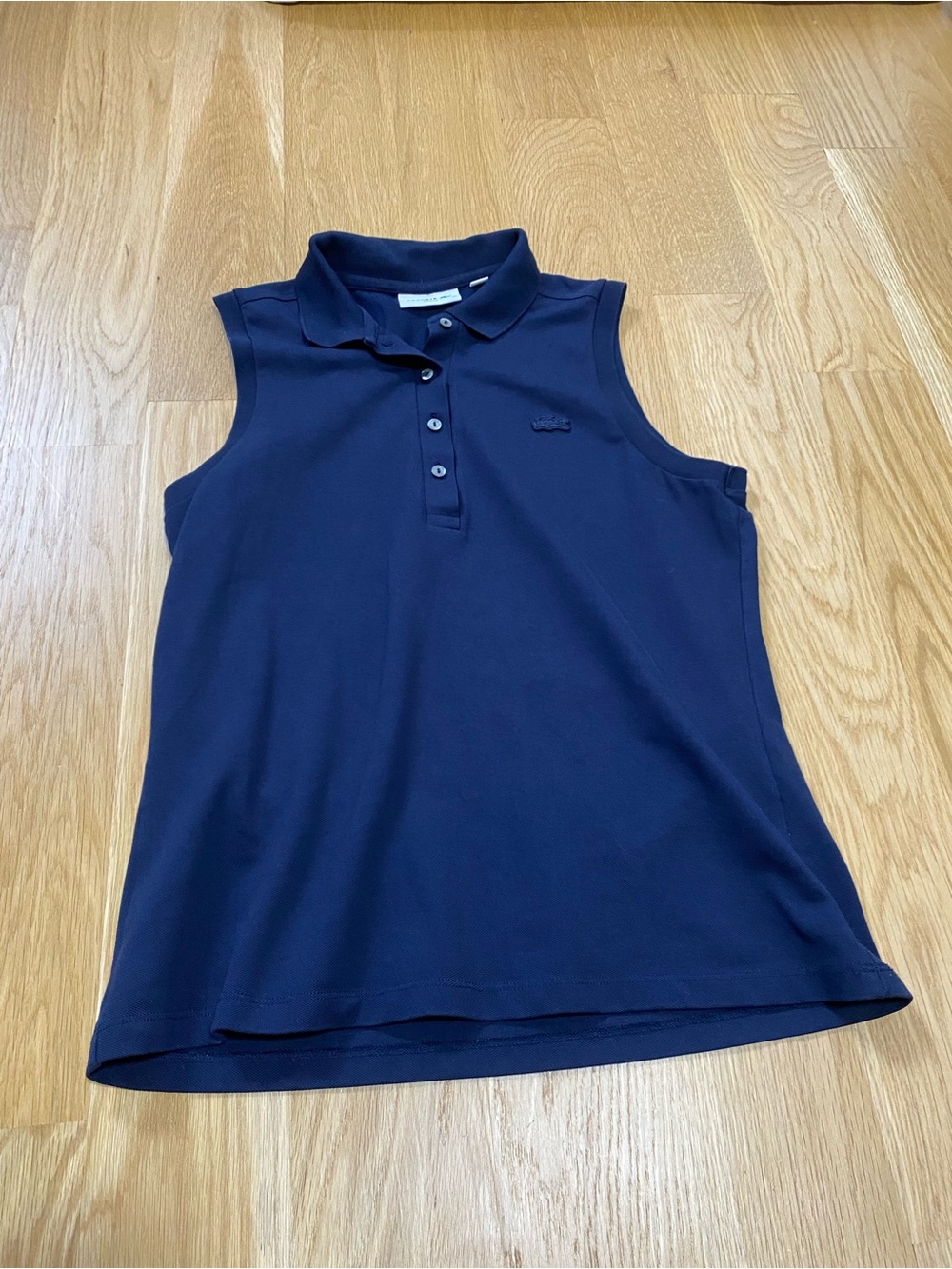 Lacoste Navy Sleeveless Pique Polo in Size 40. Excellent condition!